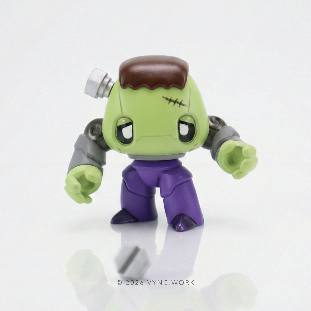 Monsters & Misfits Frankenstein inspired art toy front view arms raised